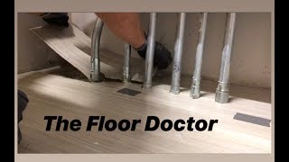 How to Install Vinyl Flooring Around Pipes [upl. by Anide40]