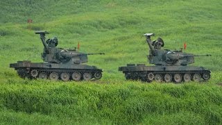 Japans Mitsubishi Type 87 selfpropelled antiaircraft gun Oerlikon 35 mm twin cannon Guntank JGSDF [upl. by Wallis]